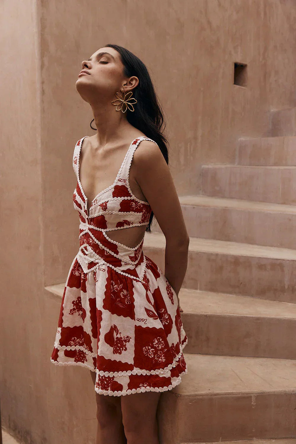 Montaracrest floral cutout dress featuring a stylish design with vibrant floral patterns and elegant cutout details.
