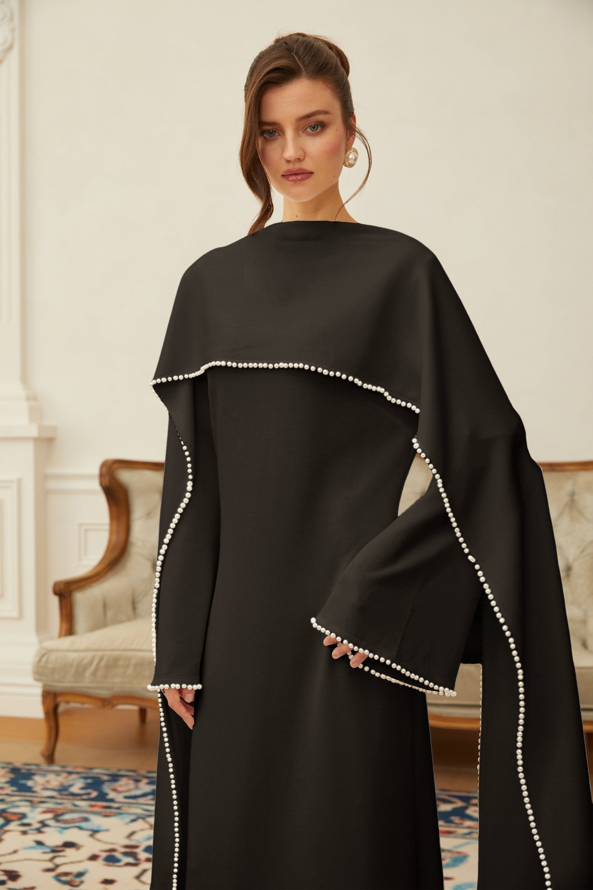 Montaracrest Piroska black maxi dress with pearl-trim shawl detail, elegant floor-length gown with sophisticated design.