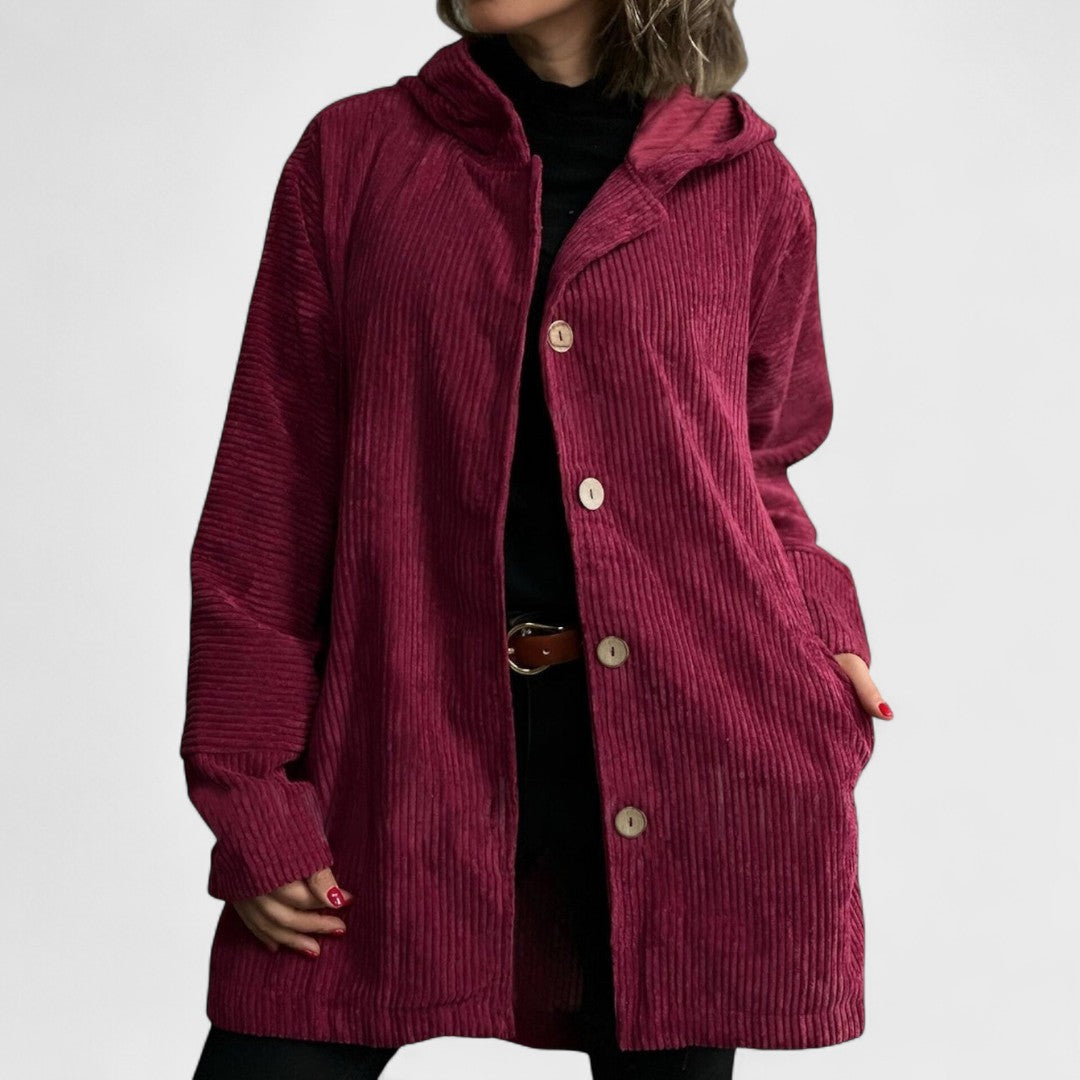 Montaracrest Cordia velvet hoodie jacket with ribbed design, front pockets, and adjustable hood, in rich textured velvet fabric.