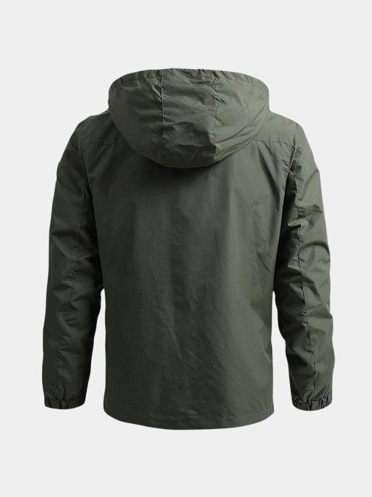 Montaracrest tactical waterproof jacket for expeditions, shown in dark color with multiple pockets and adjustable features.