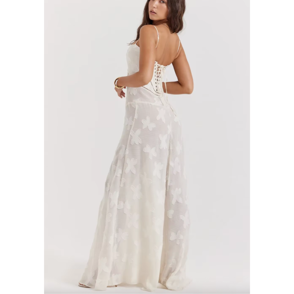 Elegant long evening dress by Montaracrest featuring a classic silhouette and intricate detailing for special occasions.