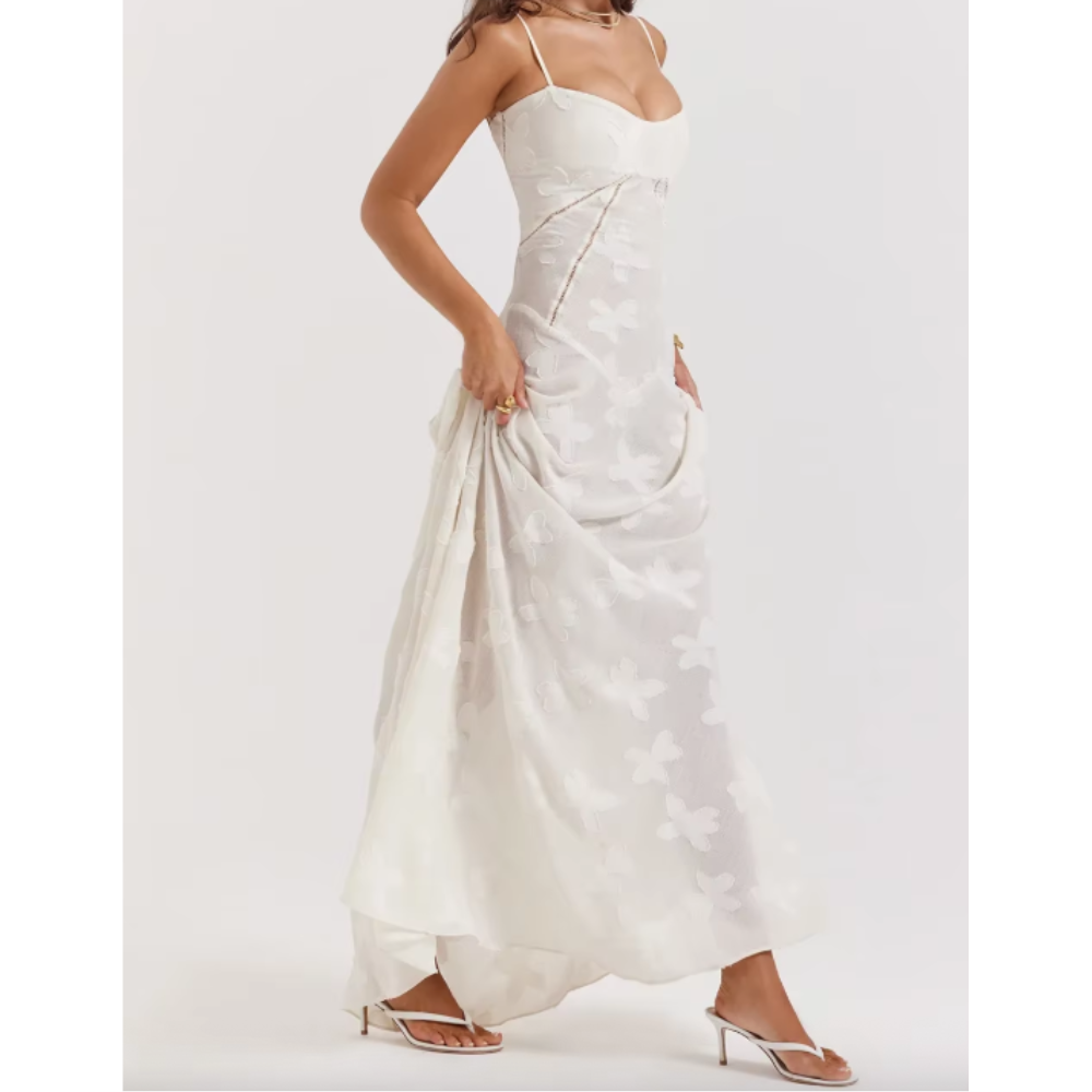 Elegant long evening dress by Montaracrest featuring flowing fabric and sophisticated design for special occasions.
