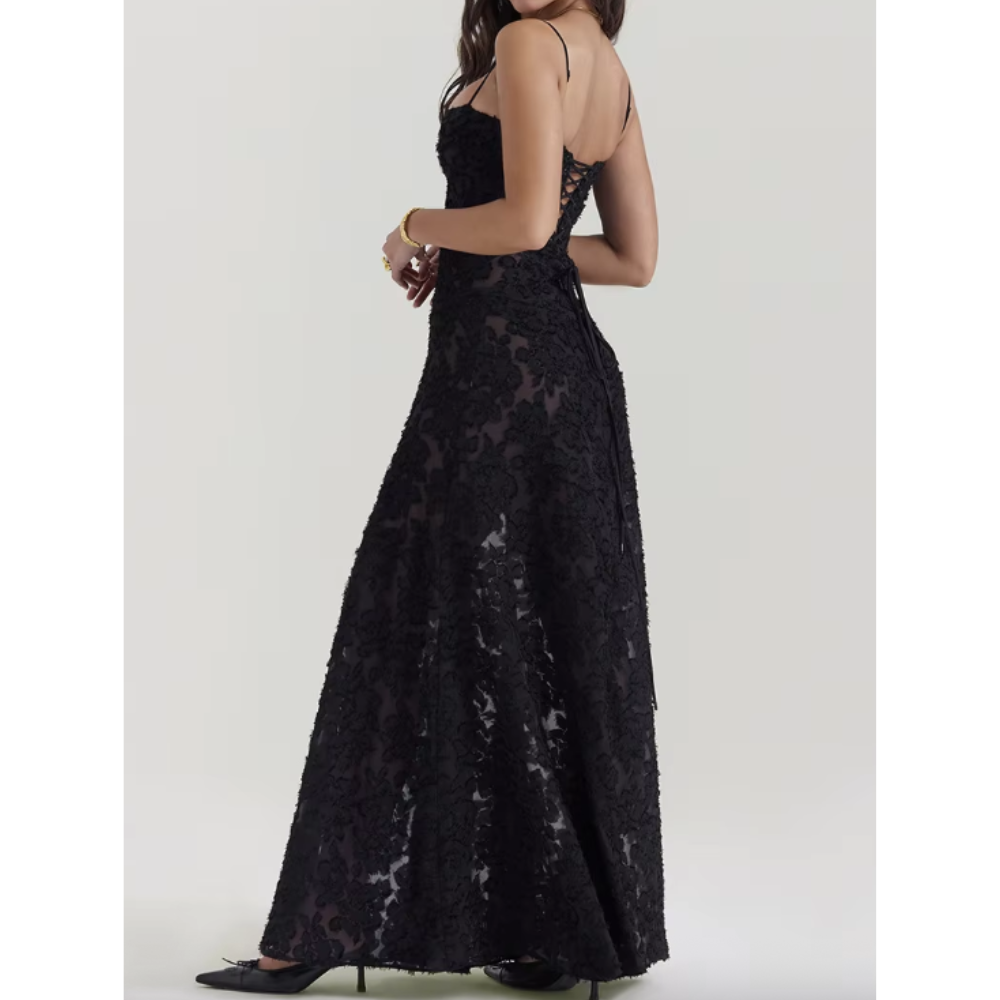 Elegant long dress by Montaracrest featuring a timeless design, perfect for special occasions, with intricate details and flowing fabric.