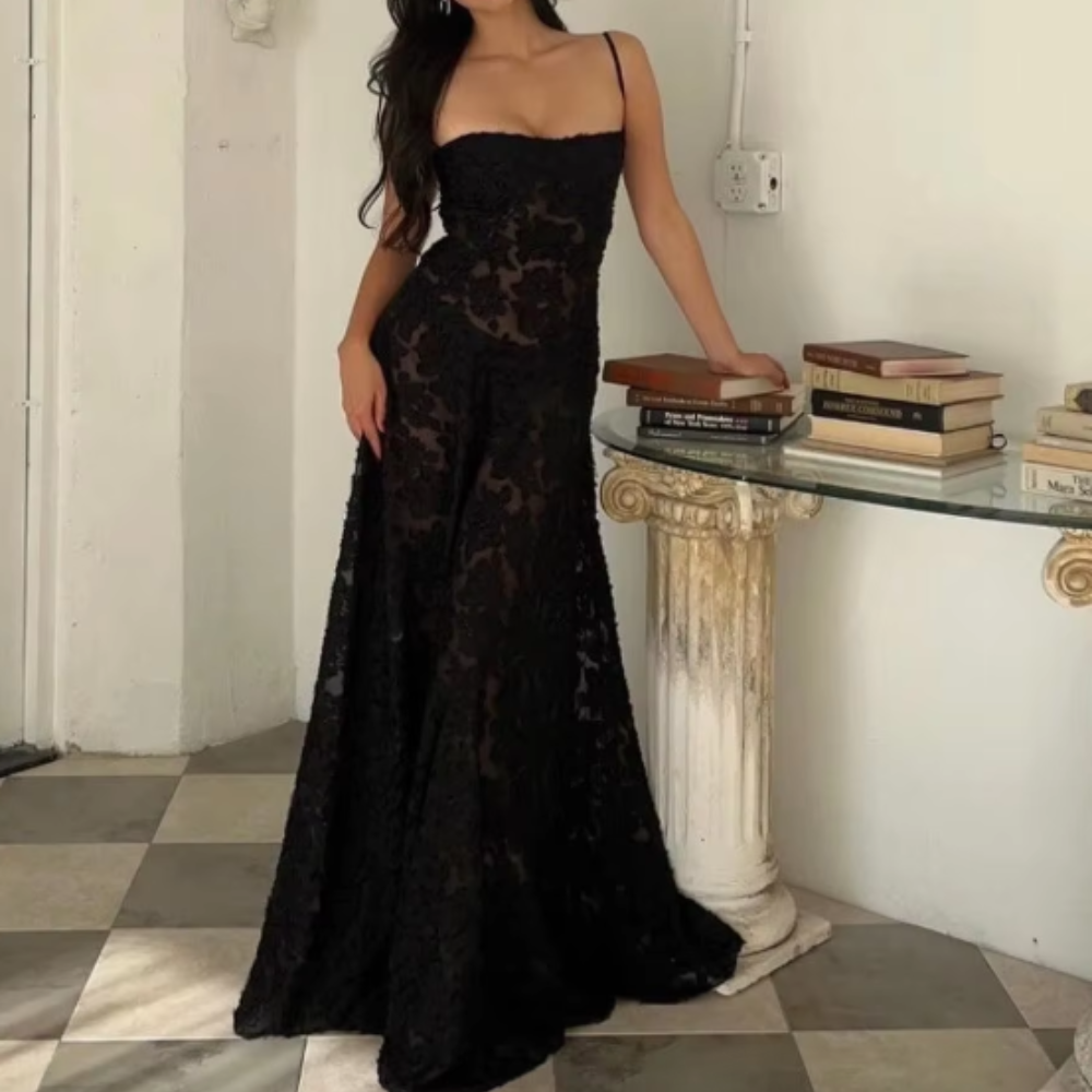 Elegant long dress by Montaracrest featuring a flowing silhouette and intricate detailing, perfect for special occasions.