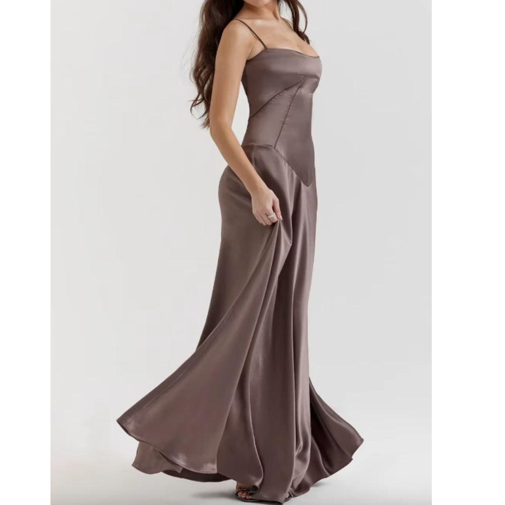 Elegant long dress by Montaracrest featuring a flowing silhouette and intricate details, perfect for special occasions.