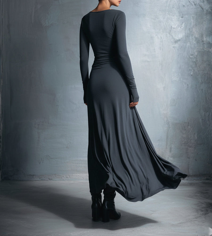 Vittoria maxi dress with side knot detail by Montaracrest, flowing fabric and elegant design, shown on a model.