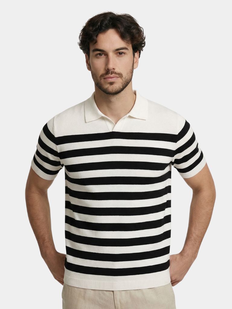 Montaracrest Polo Riviera Nautique in navy, featuring a classic design with a collar and short sleeves, laid flat.