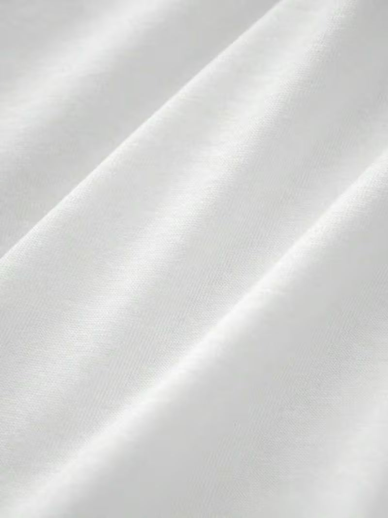 Cresta cotton cot cover with colorful printed design by Montara & Crest, showcasing soft fabric and vibrant pattern.