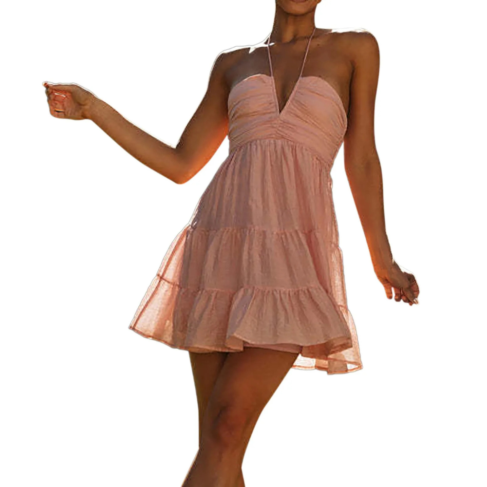 Lightweight summer dress by Montaracrest featuring a halter neckline and a ruffled skirt, perfect for warm weather.