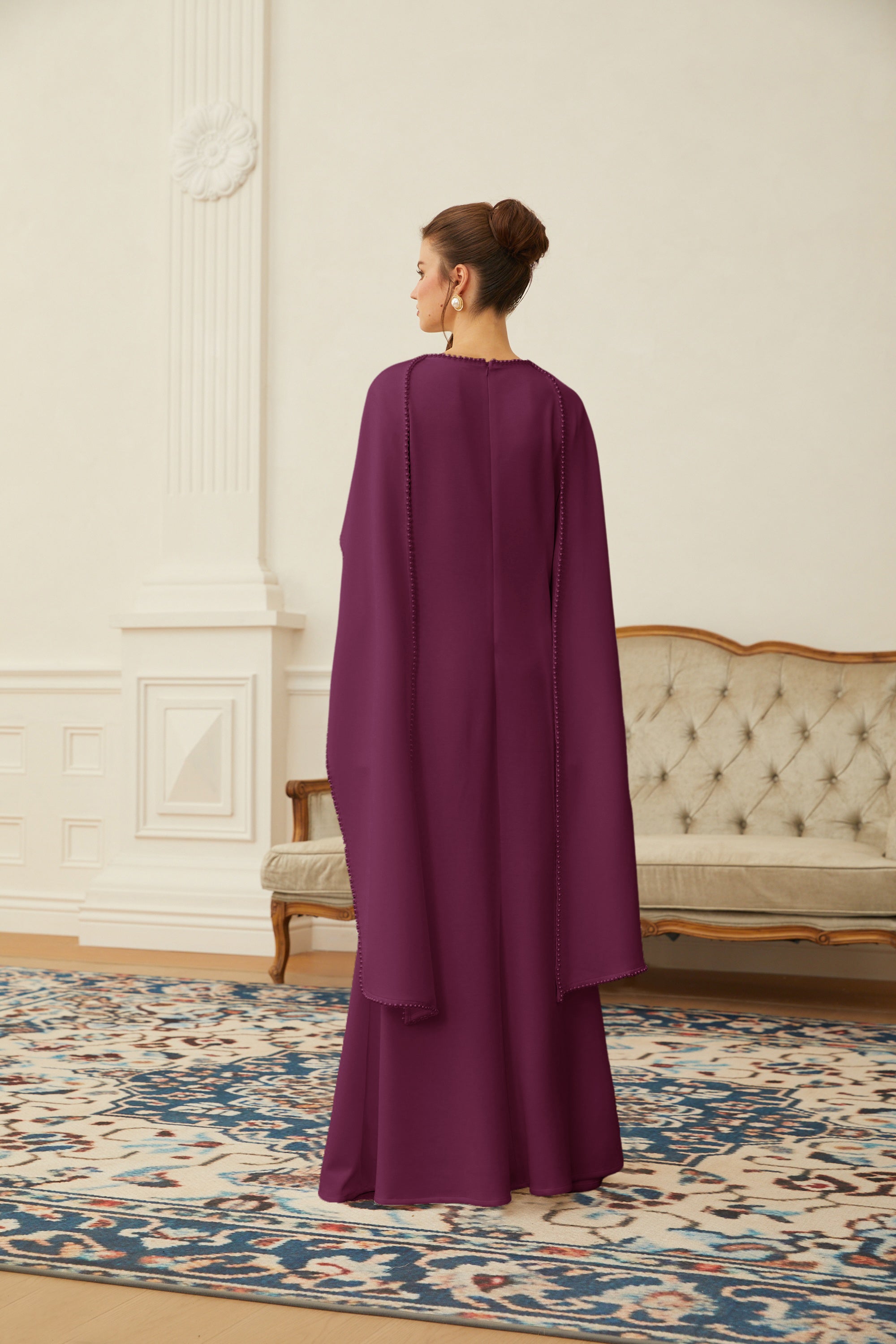 Montaracrest Piroska Purple Pearl Trim Shawl Detail Maxi Dress showing flowing fabric and intricate pearl accents.