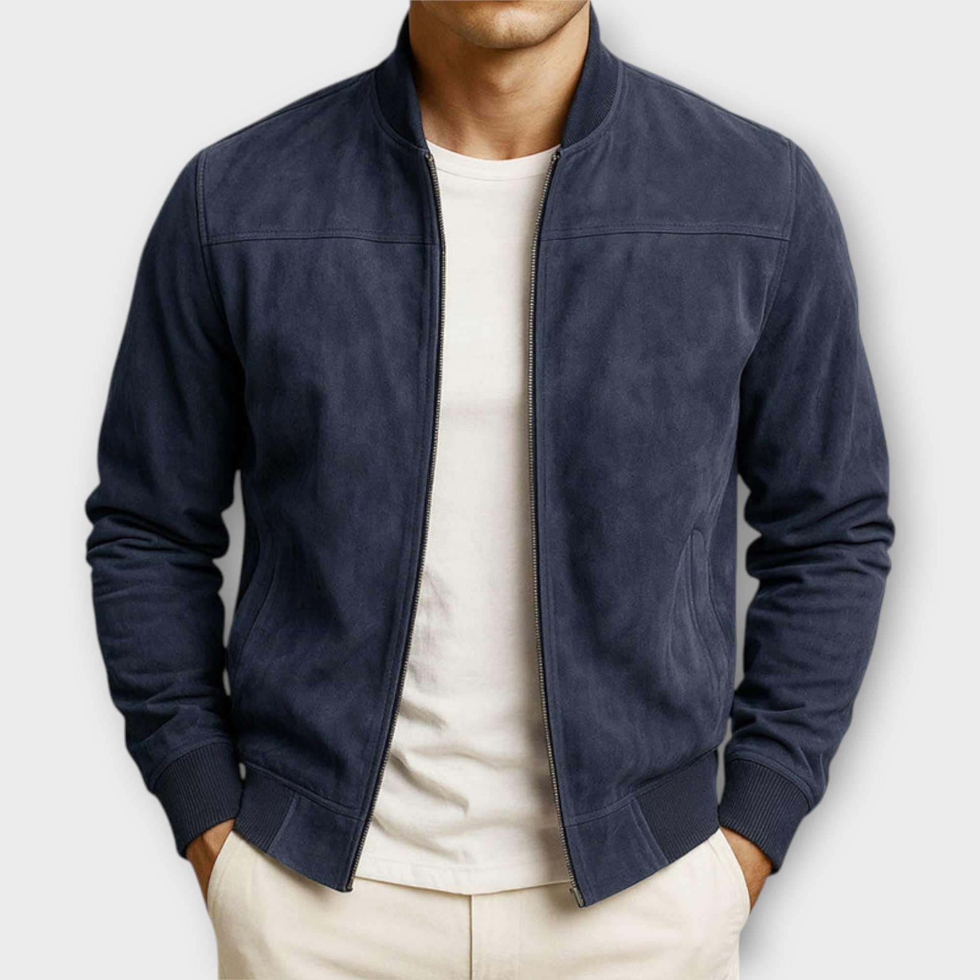Men's Rico™ suede leather jacket by Montaracrest featuring a classic fit, shown in a close-up of the tan suede material.