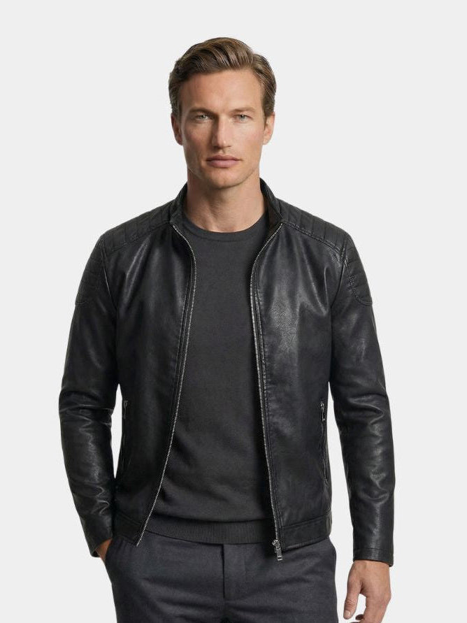 Montaracrest leather jacket with cross-stitch design, stylish black zip-up jas featuring a fitted silhouette and collar detail.