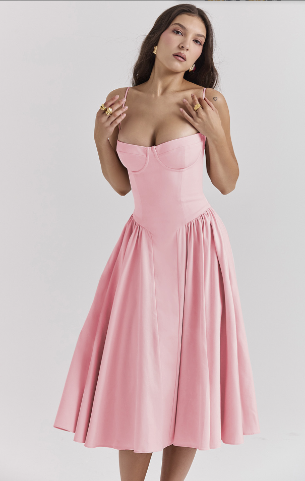 Montaracrest midi pleated dress with structured bust, featuring side pockets and elegant design, shown in the image.