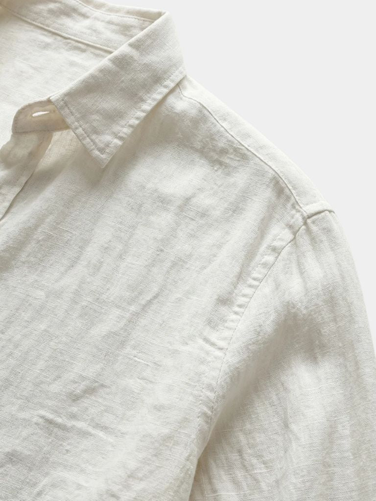 Light beige Montaracrest linen summer shirt with a relaxed fit, featuring a classic collar and short sleeves.