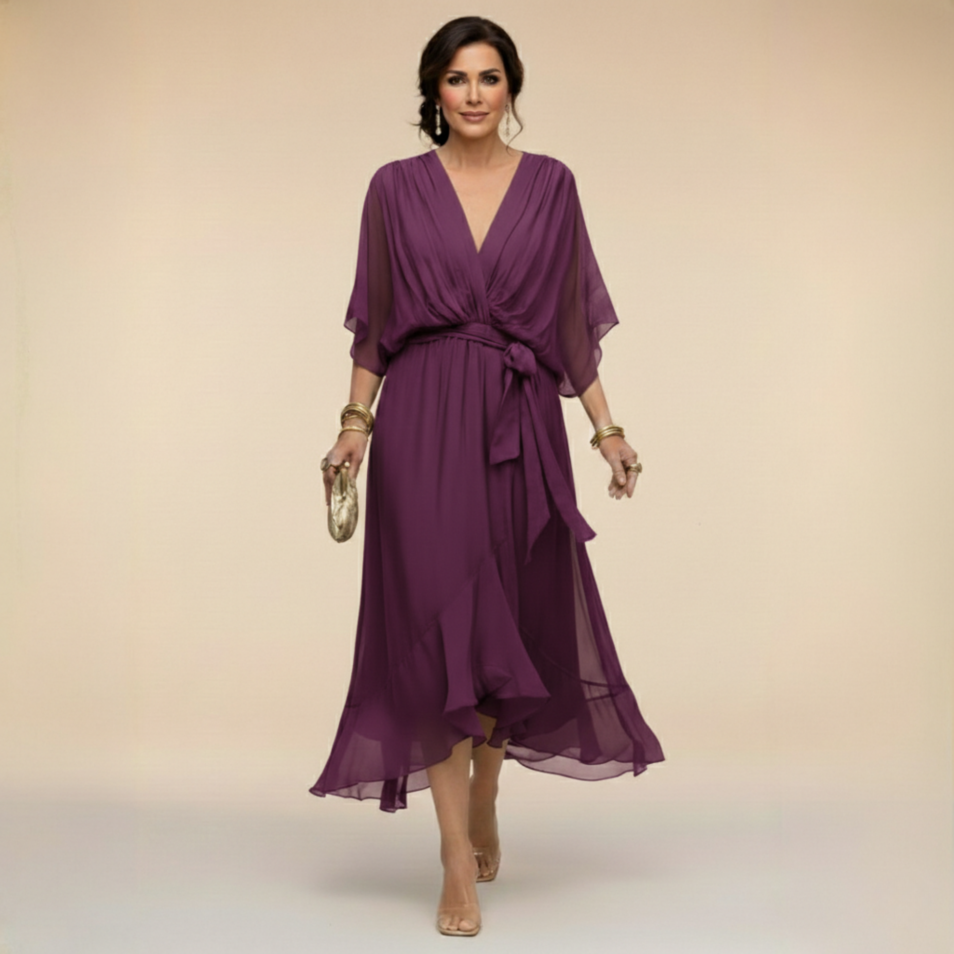 Montaracrest Monica chiffon dress with V-neckline, lightweight fabric, and elegant sleeveless design for stylish occasions.