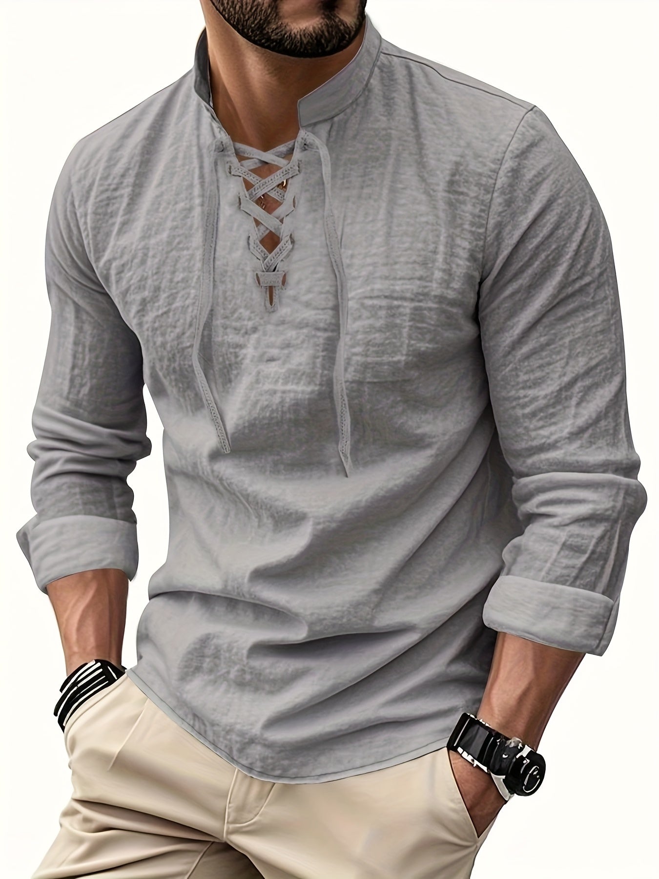 Montara & Crest V-neck shirt in soft fabric, displayed on a hanger with a close-up of the neckline and smooth texture.