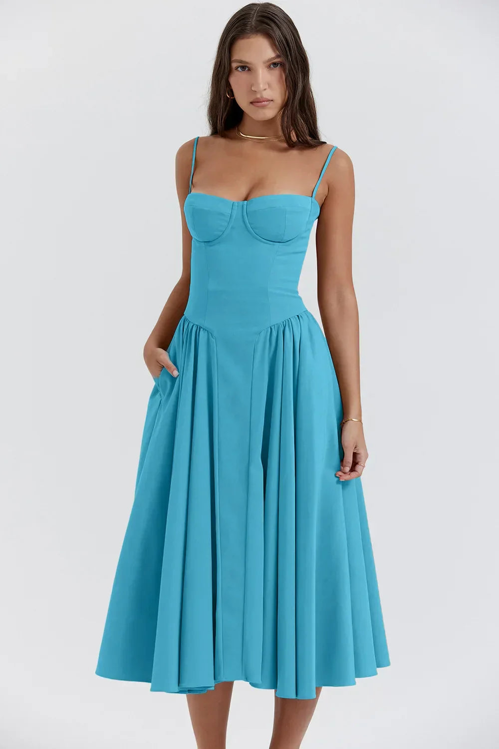 Montaracrest midi pleated dress with structured bodice and side pockets, featuring a stylish, elegant design.