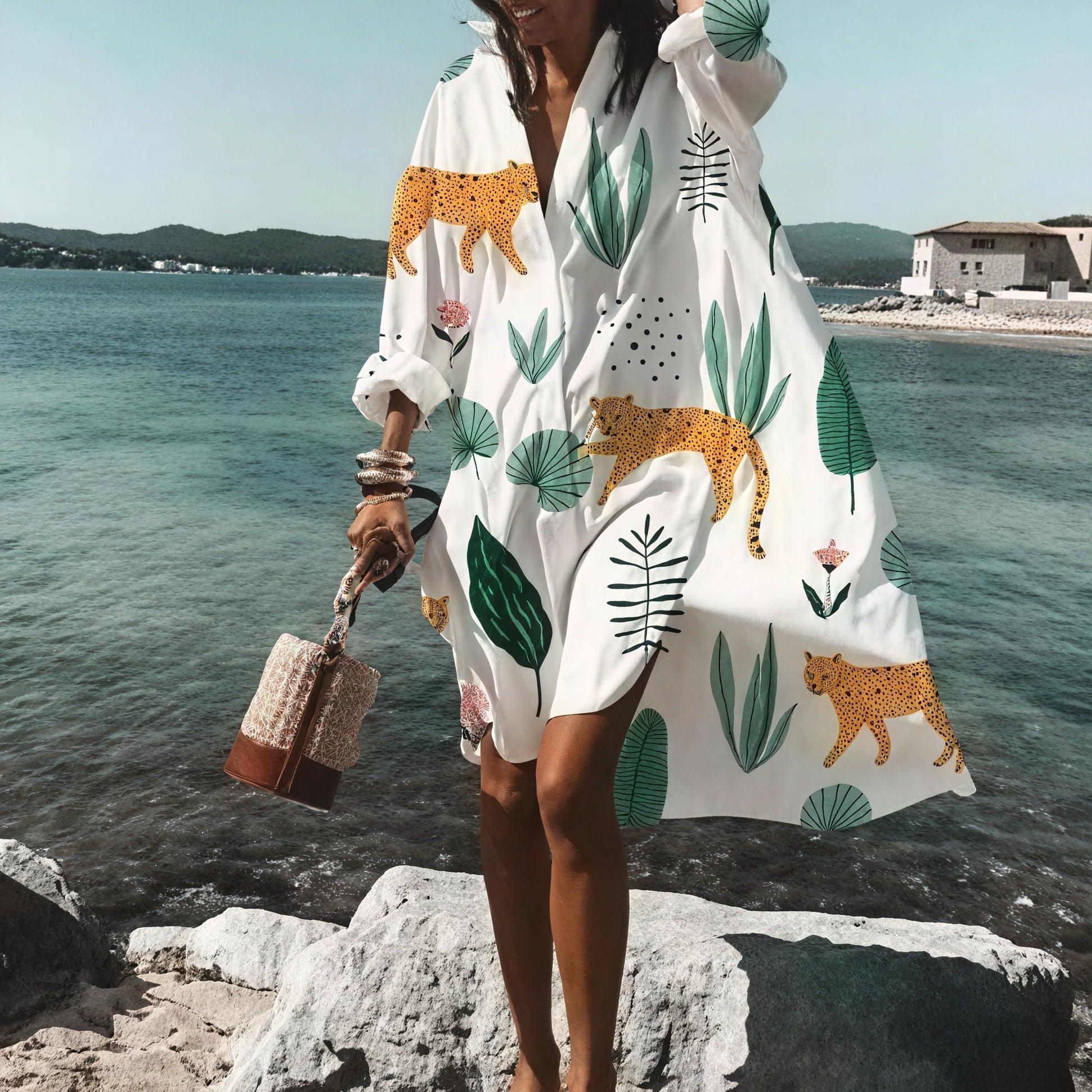 Light beige oversized summer dress with buttons from Montaracrest, featuring a relaxed fit and casual style.