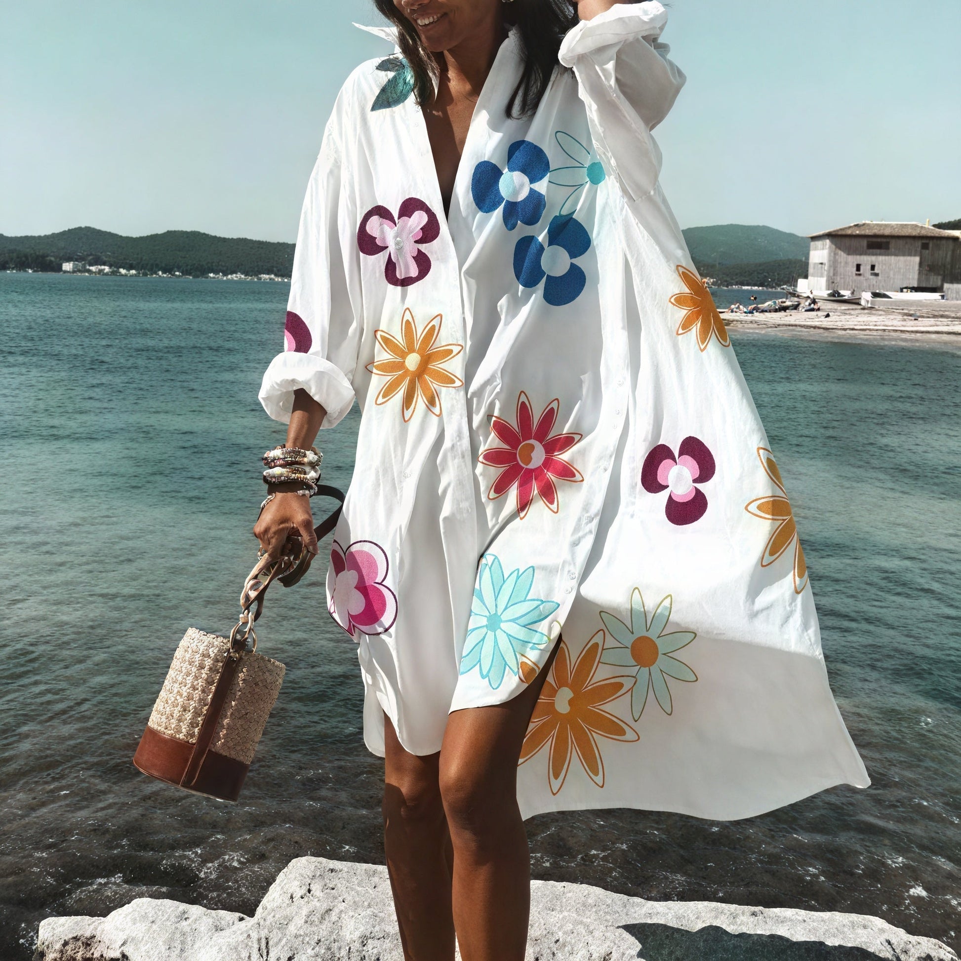 Light beige oversized summer dress with buttons from Montaracrest, featuring a relaxed fit and casual style.