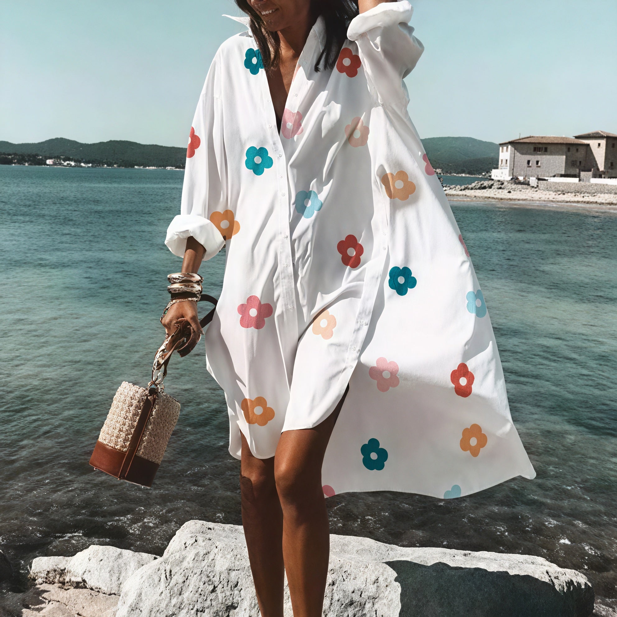 Light beige oversized summer dress with button details from Montaracrest, featuring a relaxed fit and casual style.