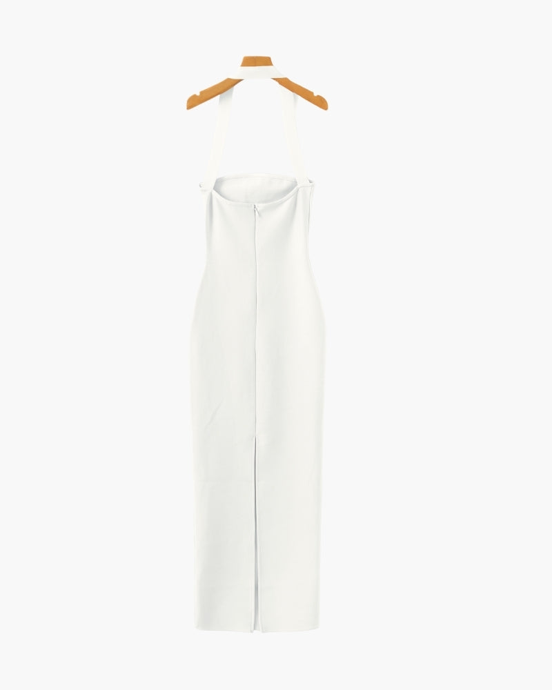 Slim fit maxi dress with halter neckline by Montaracrest, displayed on a model showcasing its elegant design and flowing fabric.