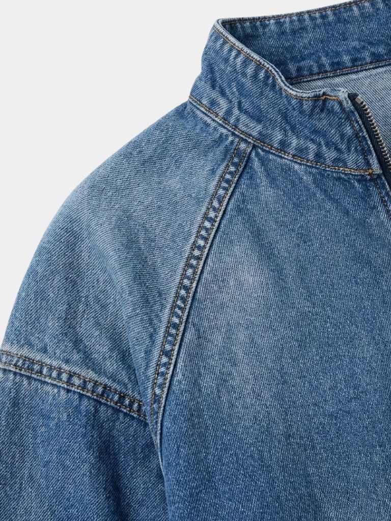Montaracrest denim stonewash jacket with quarter zip, casual outerwear featuring a stylish zip-up front and classic denim texture.
