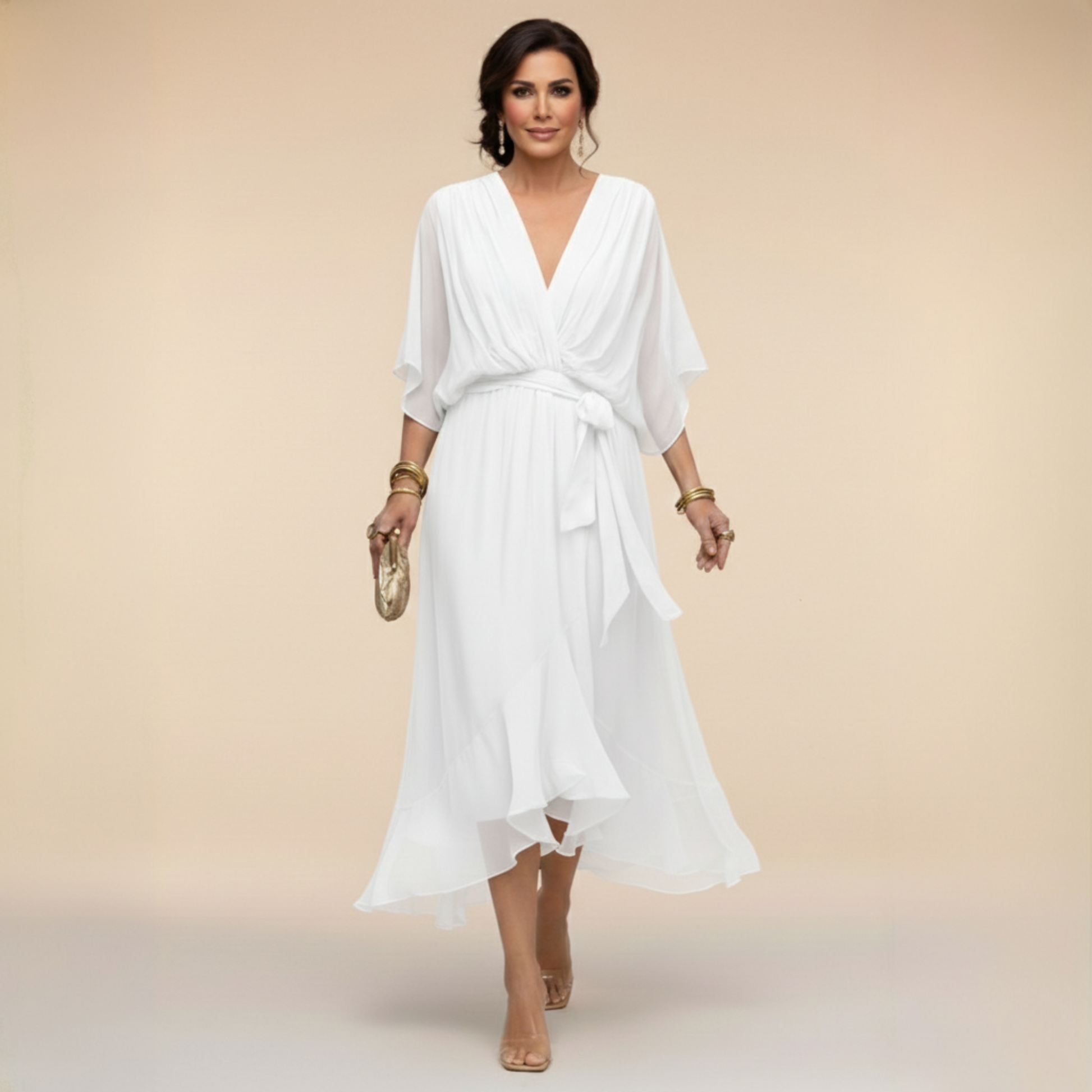 Montaracrest Monica chiffon dress with V-neckline, flowing fabric, and elegant sleeveless design.
