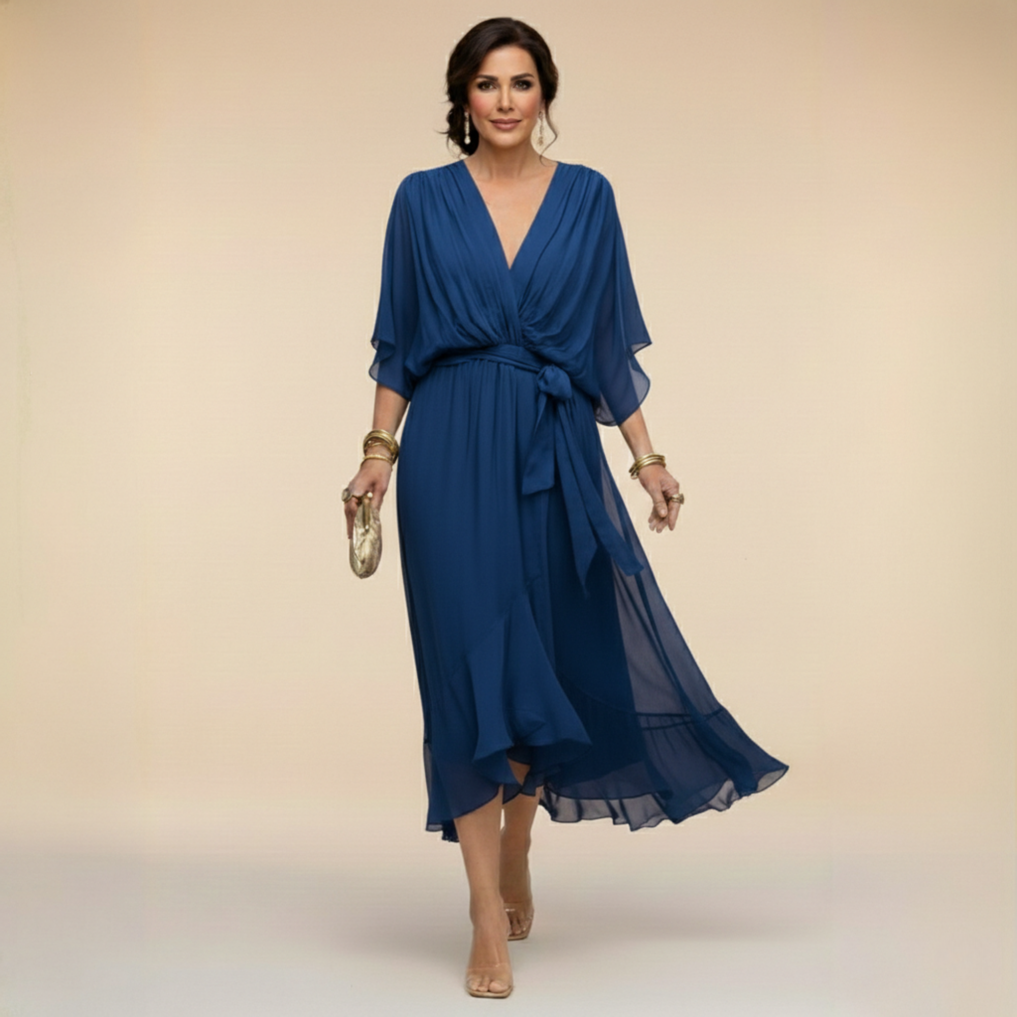 Montaracrest Monica chiffon dress with V-neckline, flowing fabric, and elegant design, shown on a model.