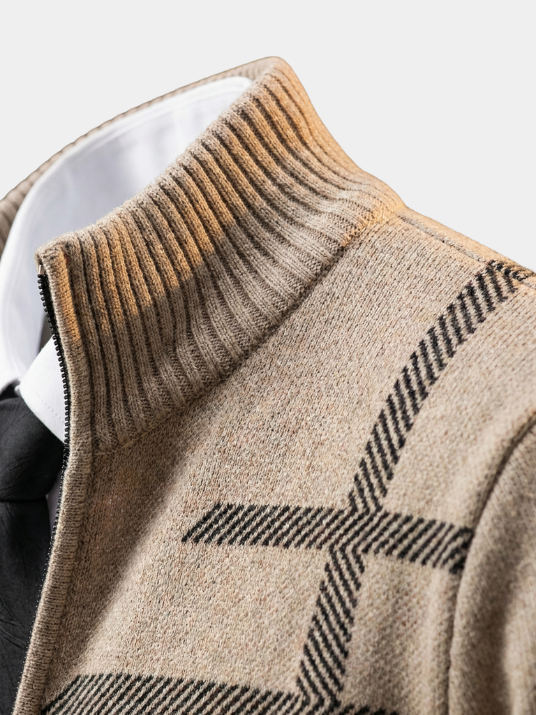Montaracrest graphite knit sweater, Symmetry design, close-up of soft, textured wool fabric with ribbed cuffs and hem.