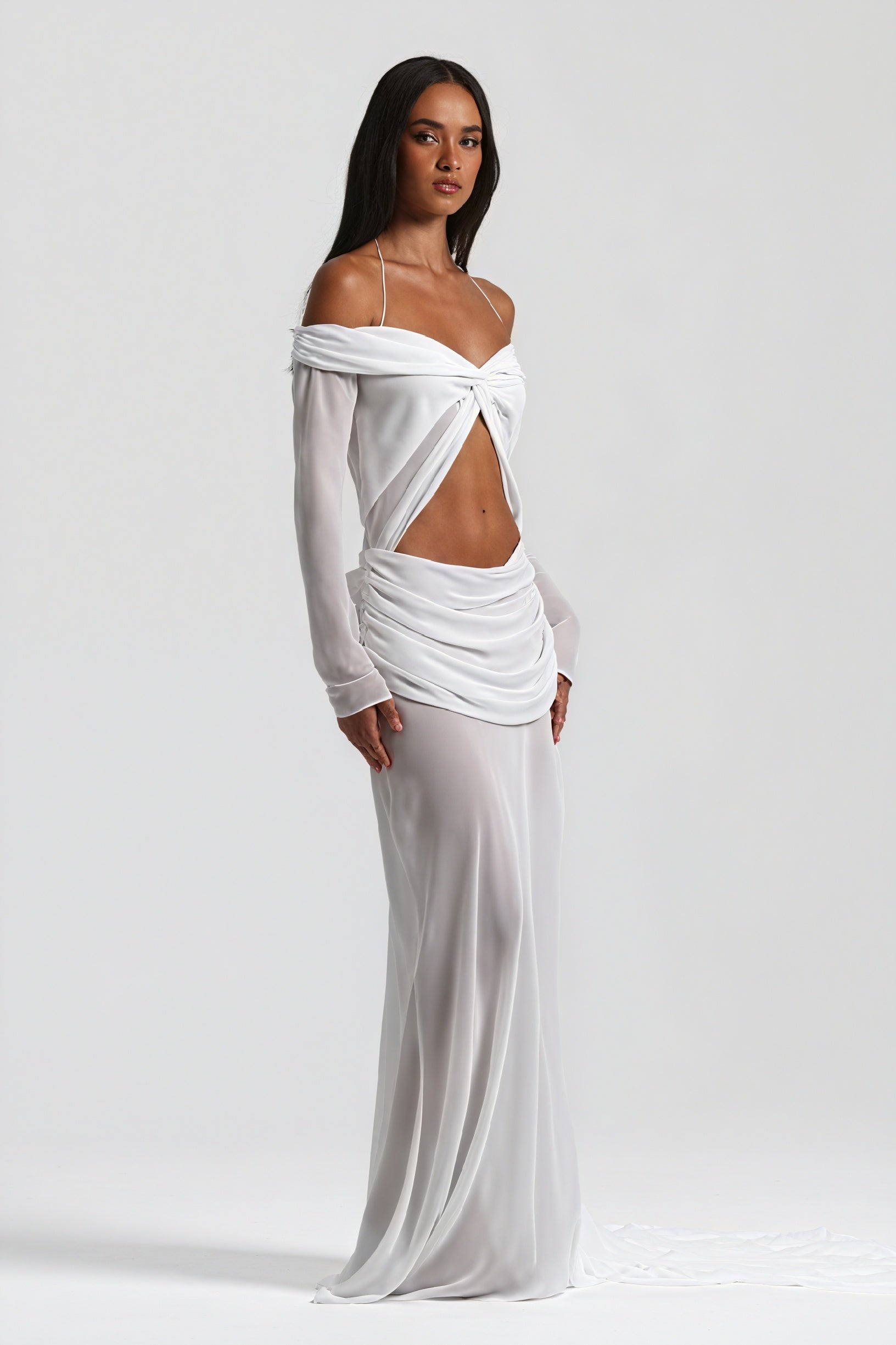 Montaracrest long dress with knot and cutout design, featuring elegant fabric and stylish silhouette.
