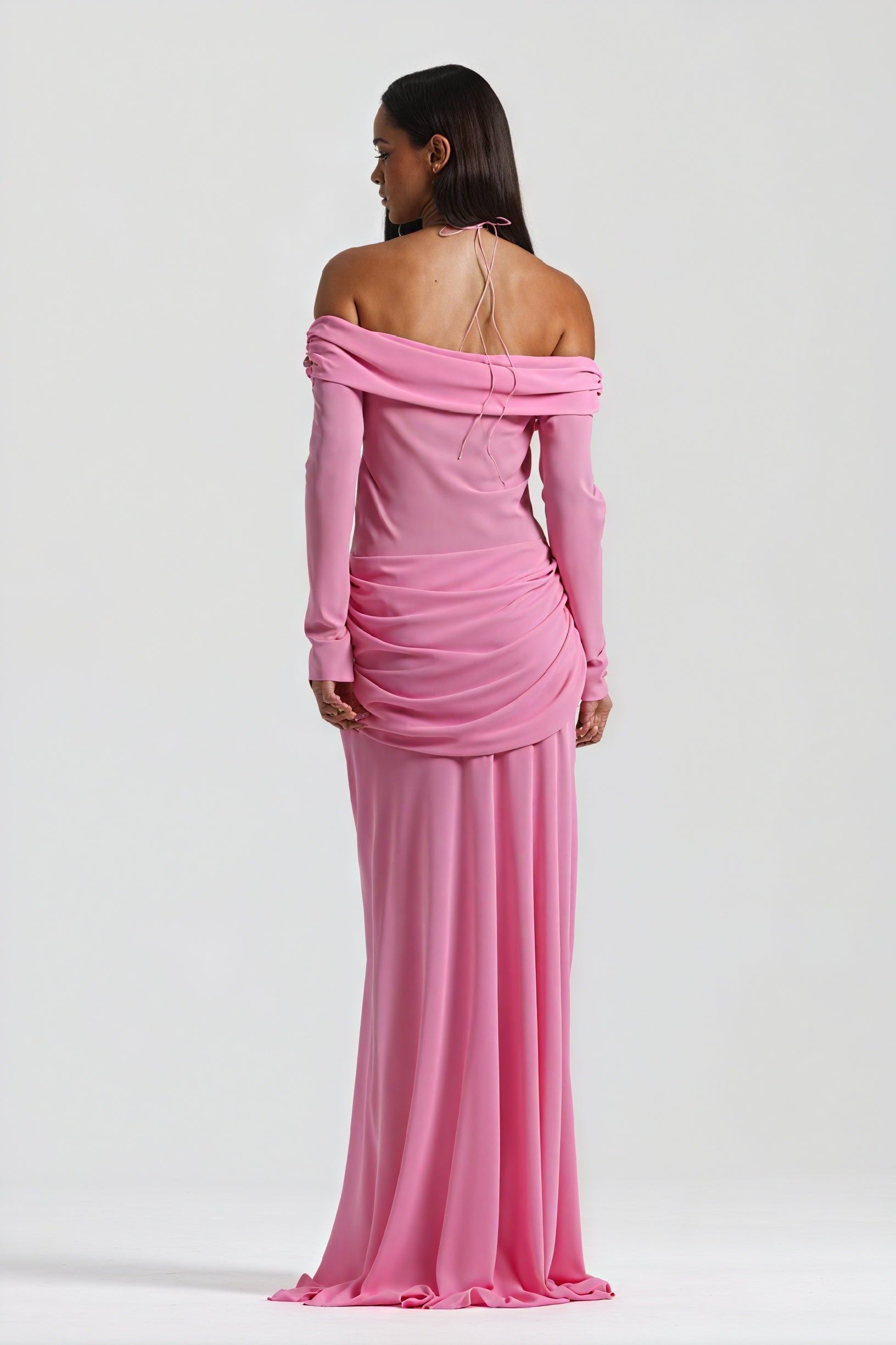 Elegant long dress with knot detail and cutout design by Montaracrest, featuring a flowing silhouette and stylish neckline.