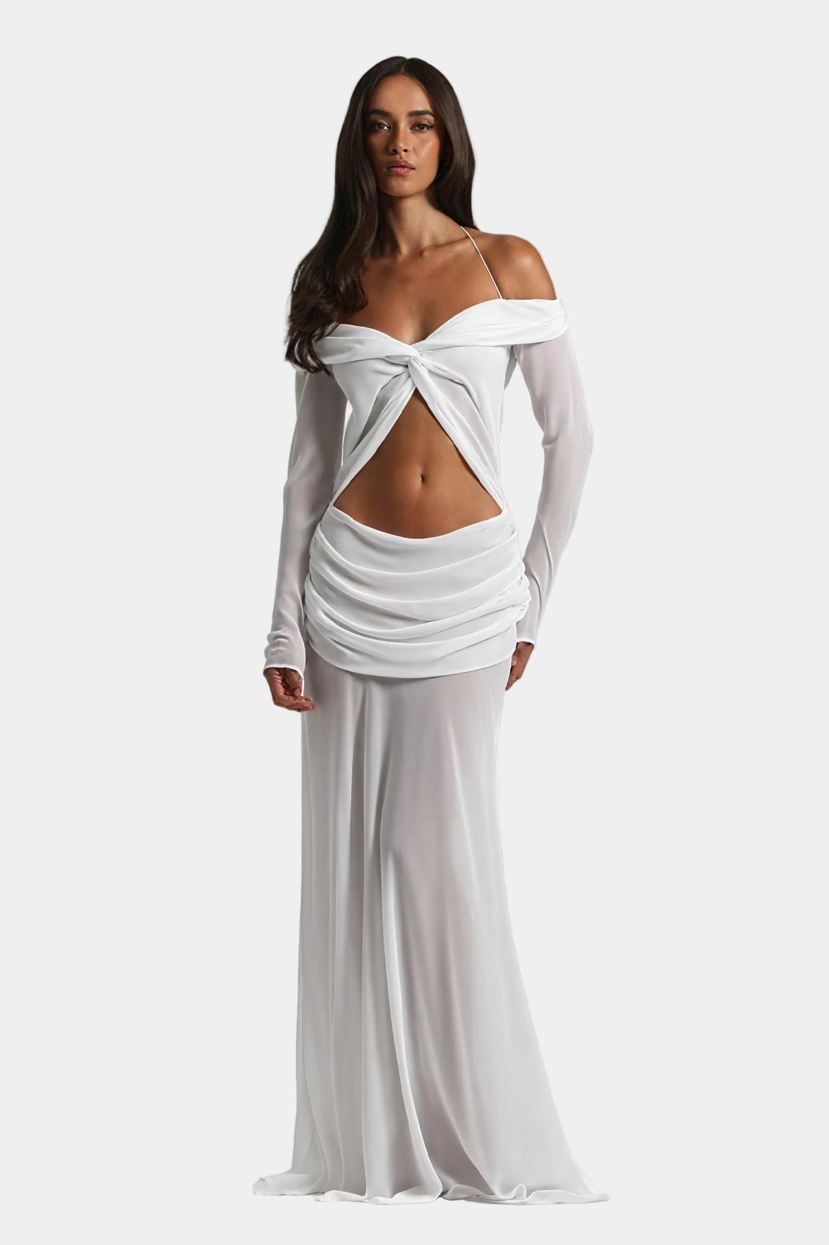 Montaracrest long dress with knot detail and cutout design, flowing fabric, and elegant style for special occasions.
