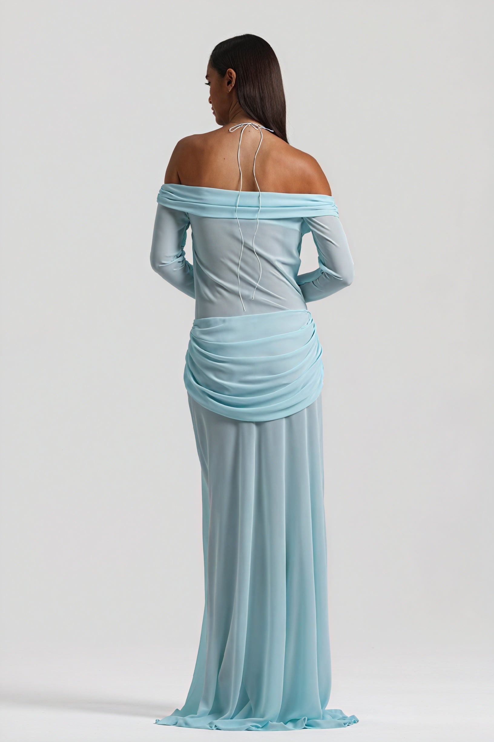 Montaracrest long dress with knot and cutout details, flowing fabric, and elegant design, shown in a full-length view.