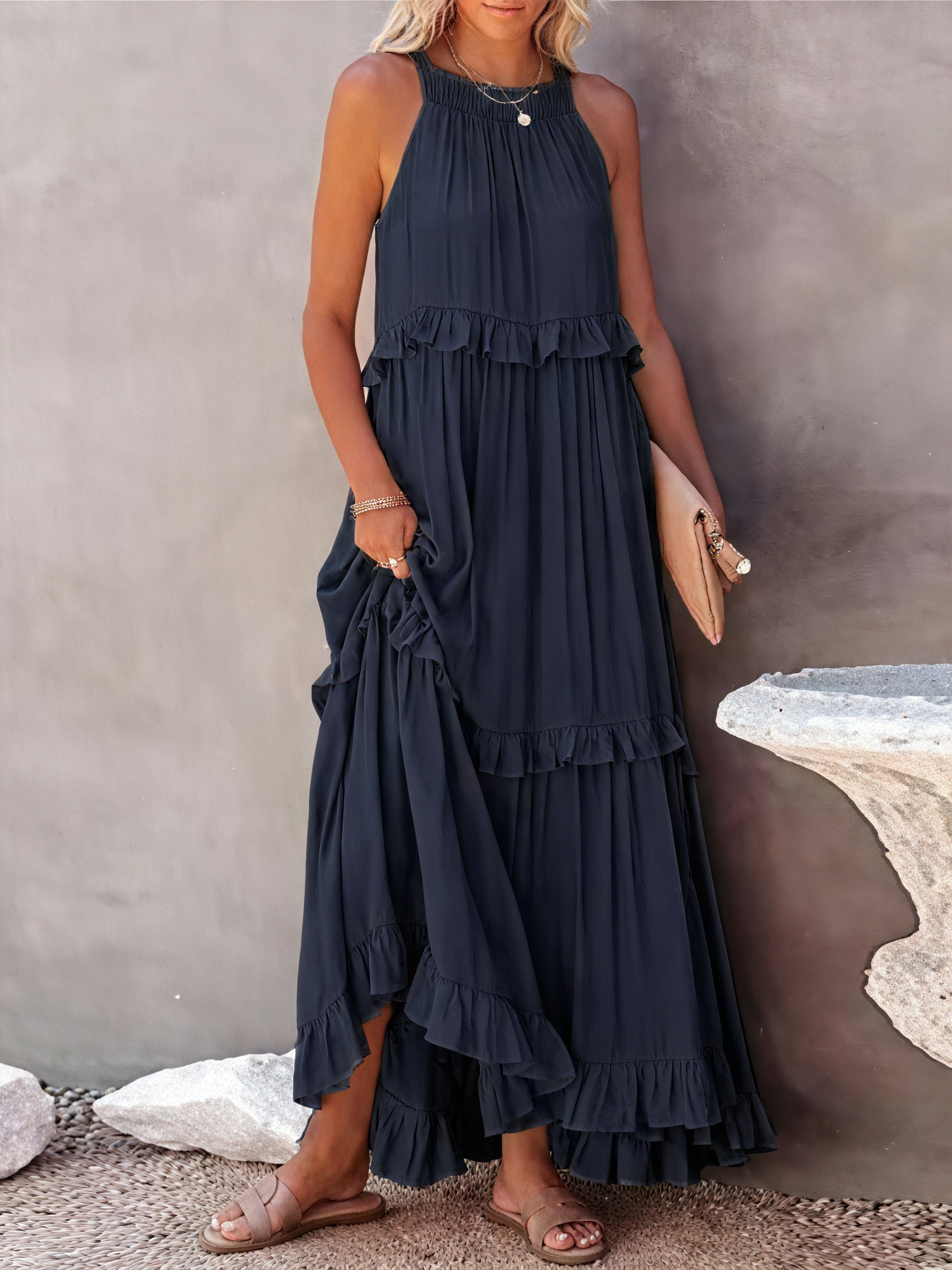 Flowy maxi dress with American-style neckline and ruffle details by Montaracrest, shown on a model.