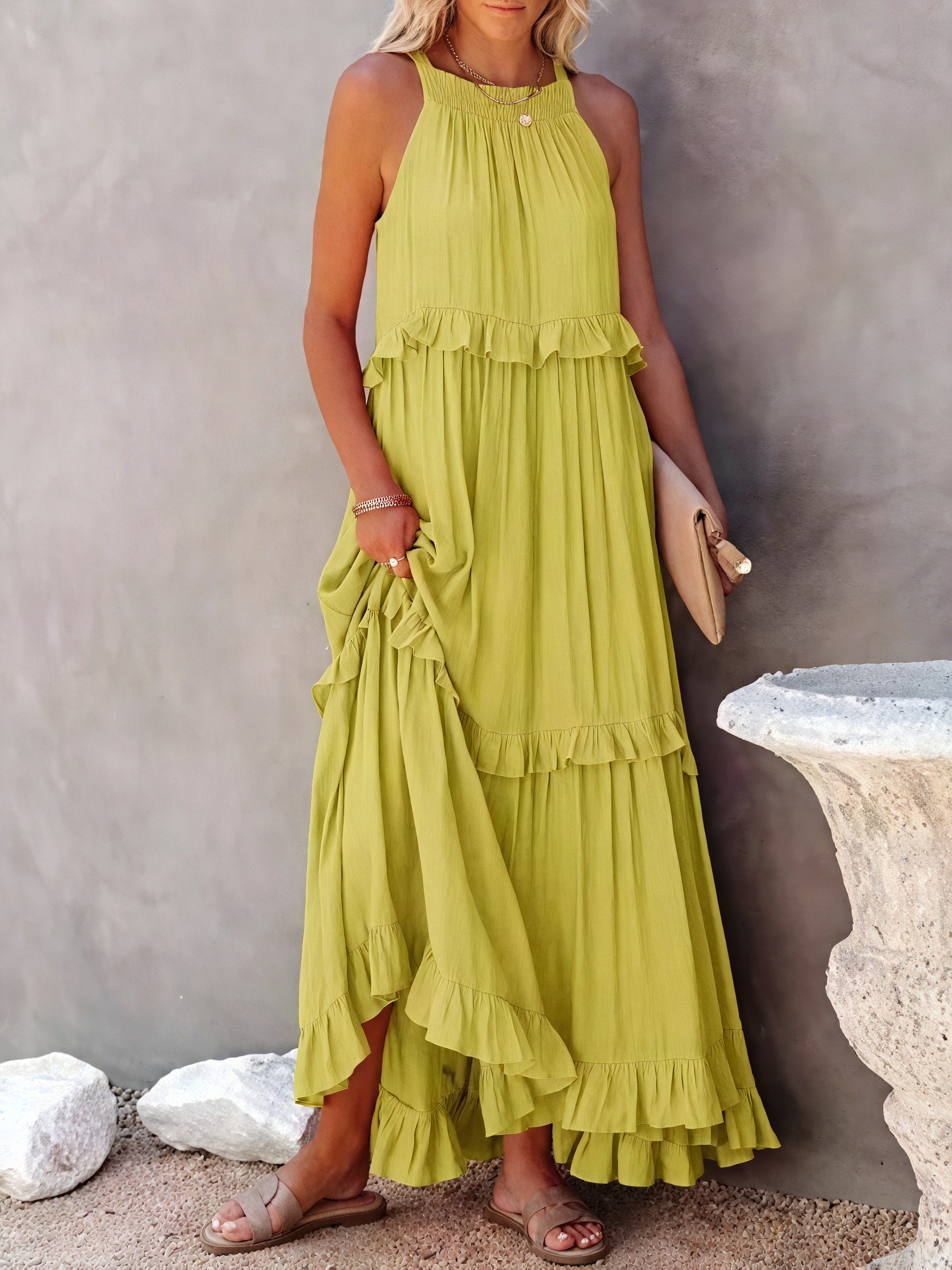 Montaracrest maxi fluid dress with American-style neckline and ruffle details, shown on a model.