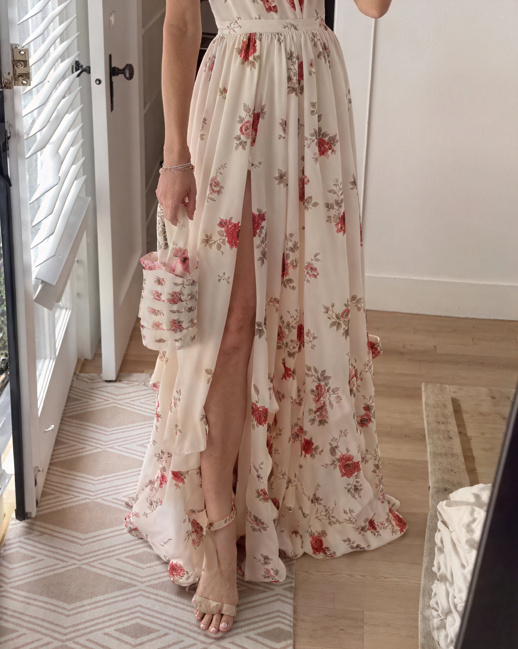 Montaracrest floral maxi dress with deep slit and thin straps, perfect for summer or special occasions.