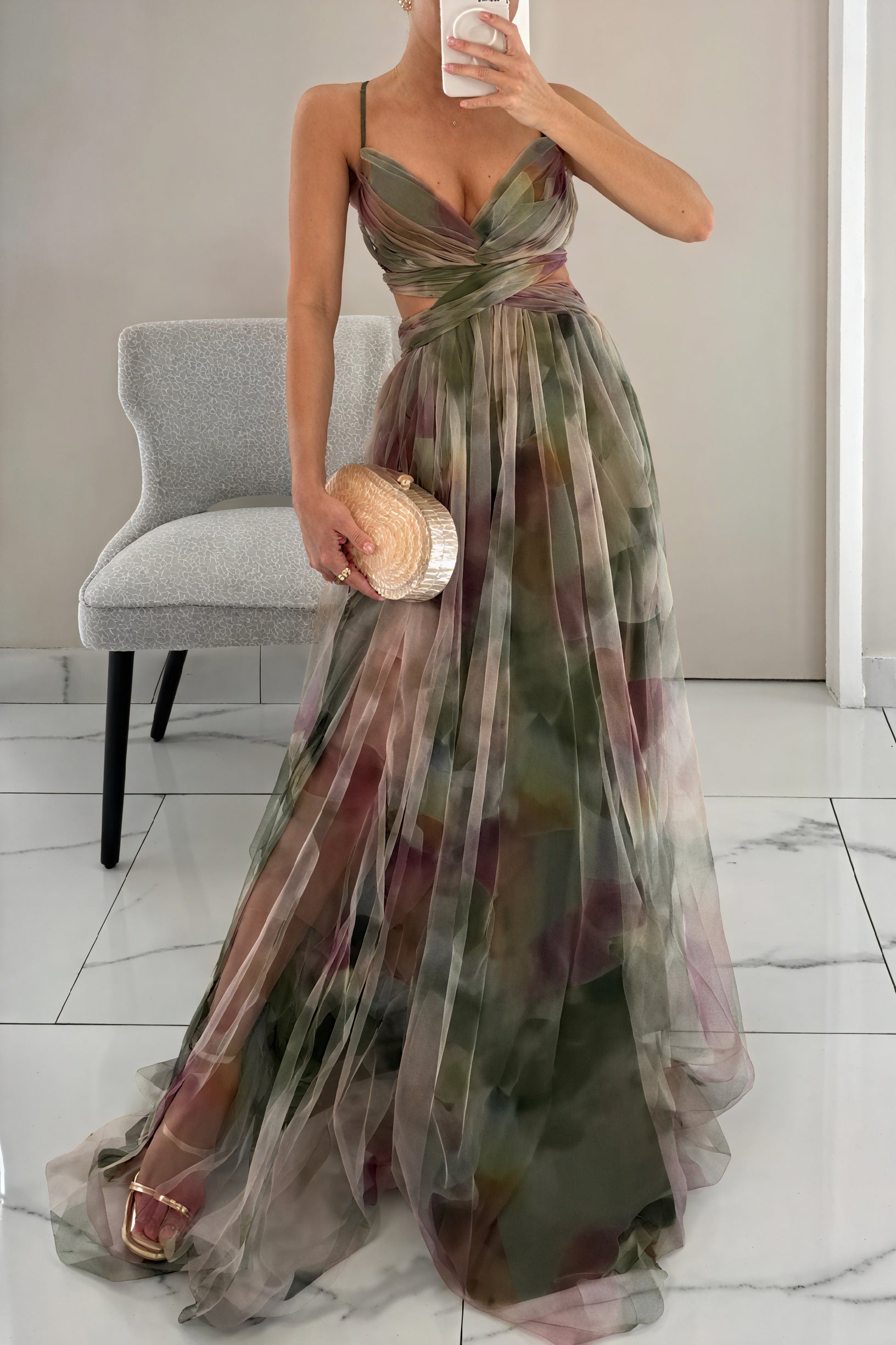 Elegant Celeste™ ethereal dress by Montaracrest featuring flowing fabric and luminous charm, shown on a model.