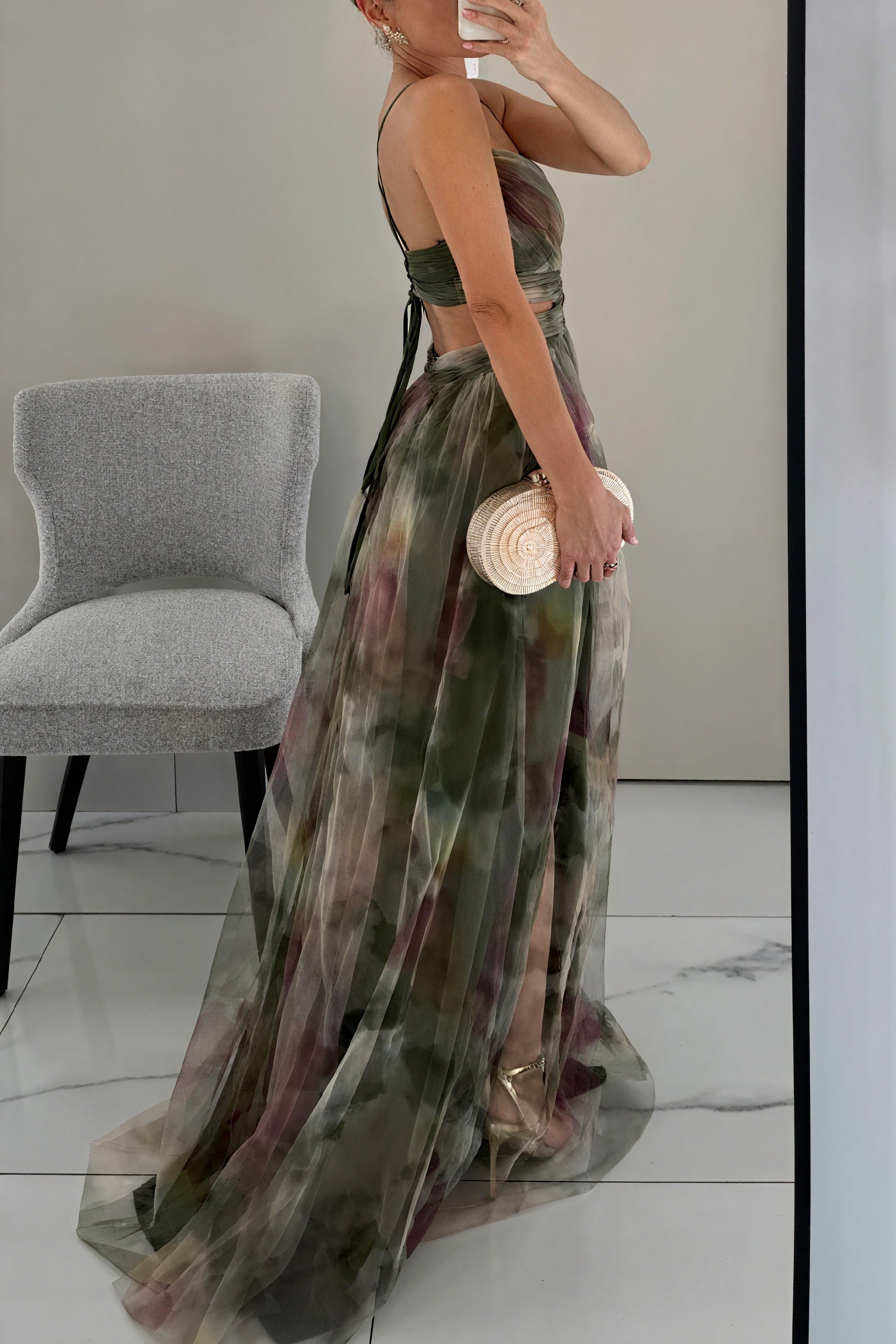 Elegant Celeste™ ethereal dress by Montaracrest featuring flowing fabric and luminous charm, displayed on a stylish mannequin.