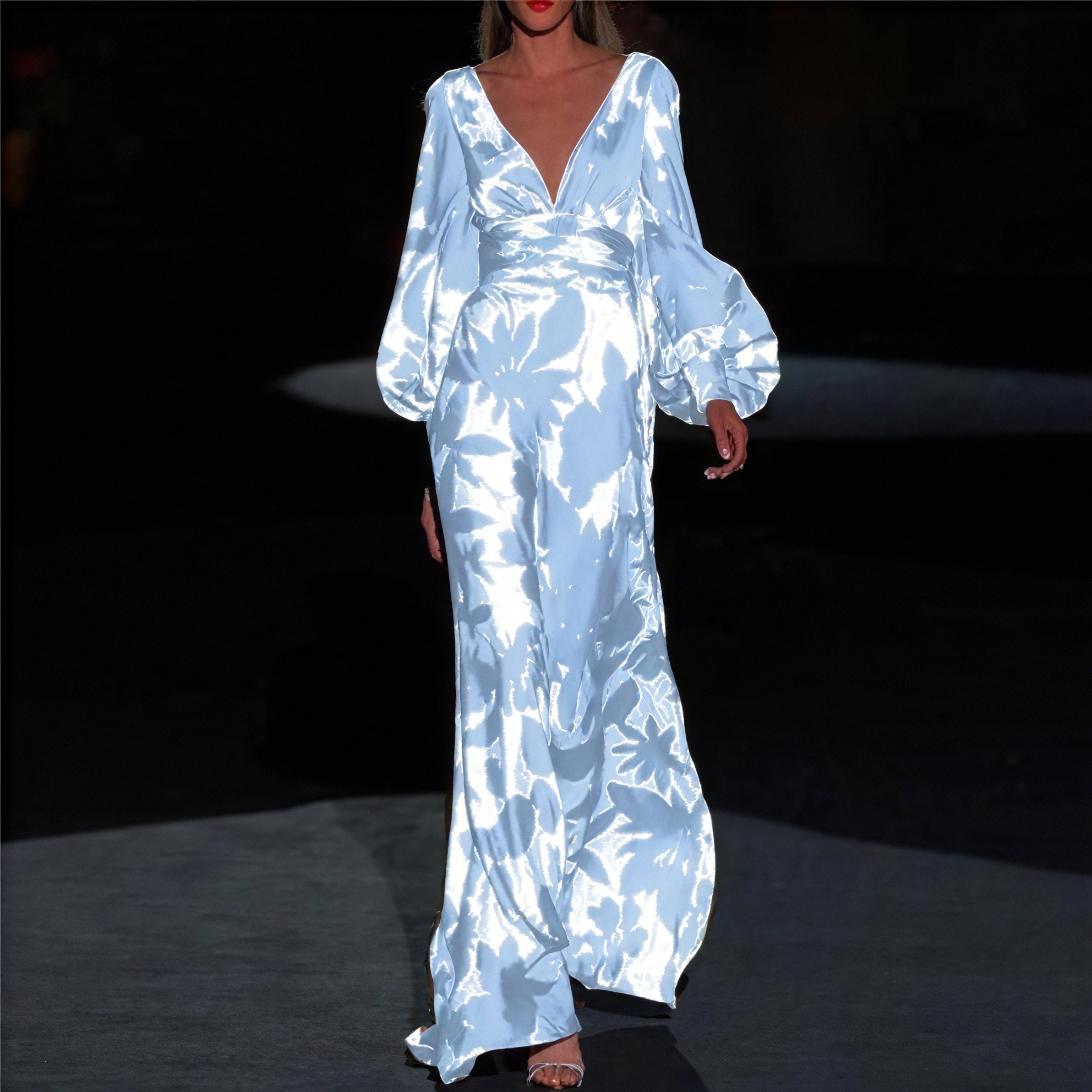 Elegant long dress by Montaracrest featuring a flowing silhouette and timeless feminine style.