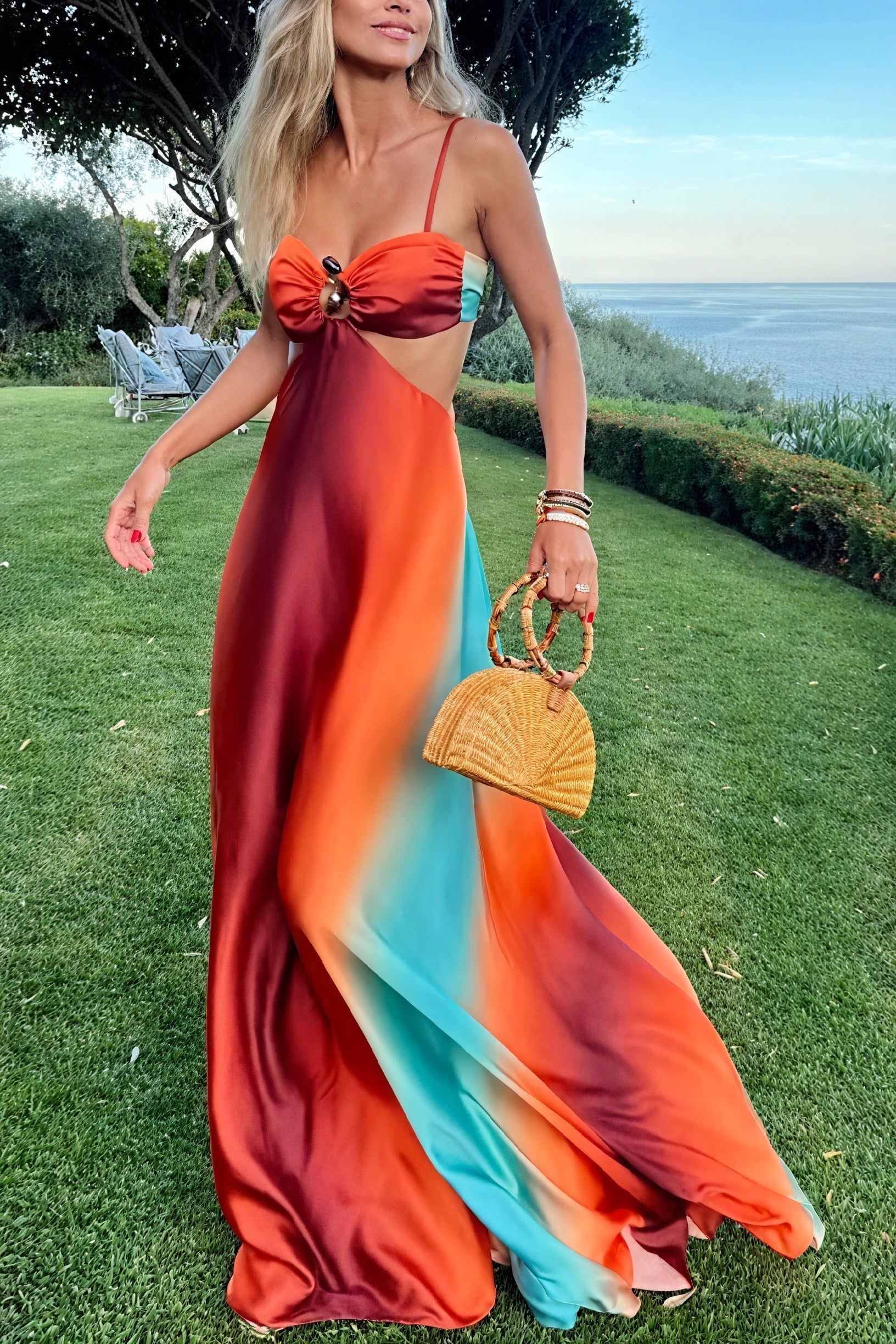 Elegant ombré satin dress with cut-out detail by Montaracrest, showcasing a sleek, fitted silhouette and subtle design accents.