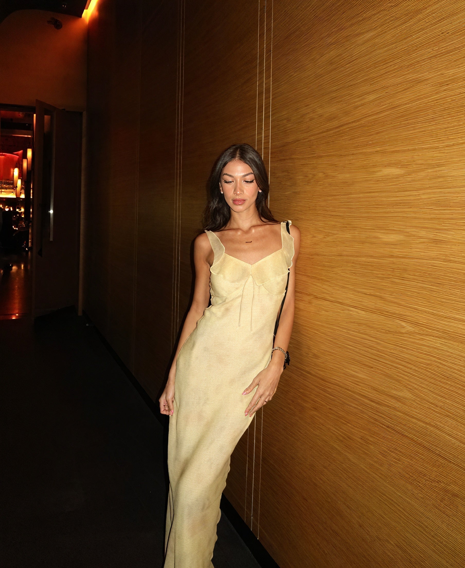 Floral dress with thin straps and ruffled details by Montaracrest, featuring a feminine, flowy design.