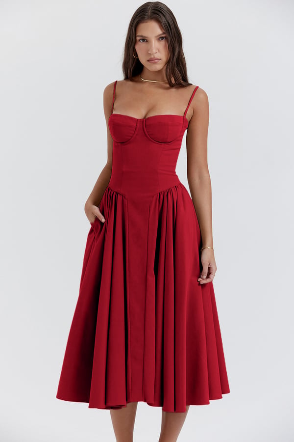 Montaracrest midi pleated dress with structured bodice and side pockets, stylish and elegant for versatile occasions.