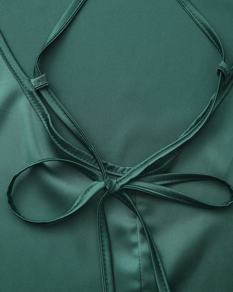 Elegant Ravelli Milano silk slip dress with smooth fabric and subtle detailing, styled by Montaracrest.