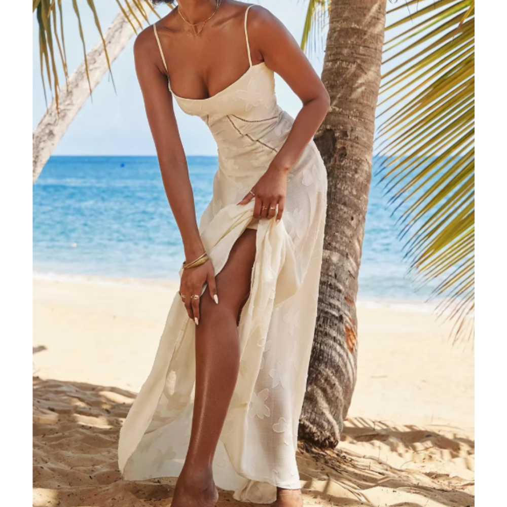 Montaracrest long elegant dress with flowing fabric, perfect for special occasions, featuring a fitted bodice and graceful silhouette.