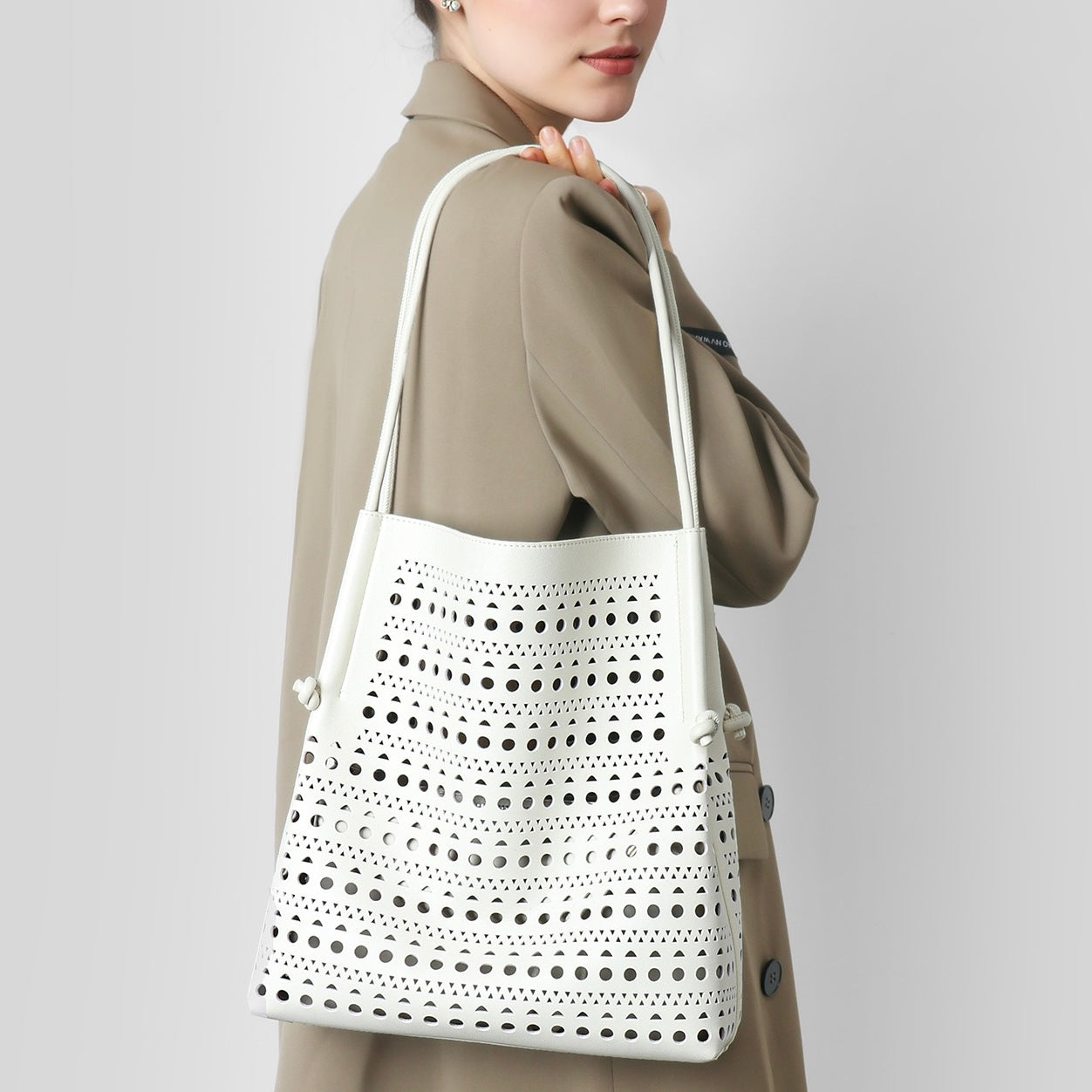 Borsa Tote Traforata in Vera Pelle con Pochette Removibile