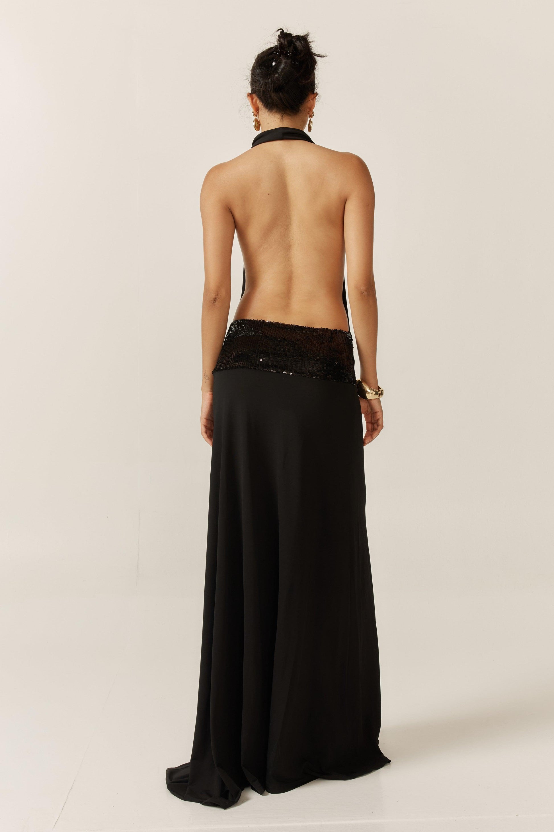 Jade sequin gown by Montaracrest featuring intricate sequin detailing and a flowing elegant design.