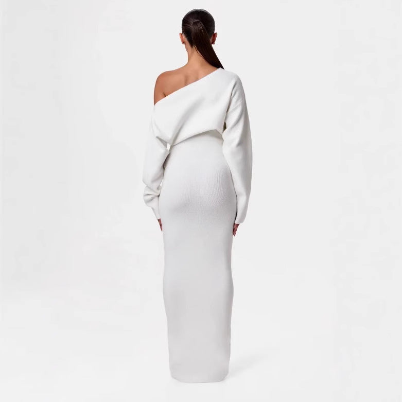 Montaracrest Evelyne off-shoulder dress in soft fabric, featuring ruffled neckline and floral pattern, perfect for summer wear.