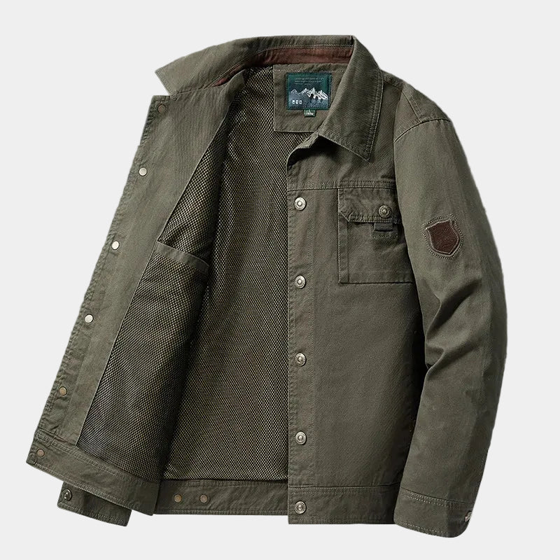 Vintage cotton Giacca Brenton jacket by Montara & Crest, displayed on a hanger showcasing its classic design and fabric texture.