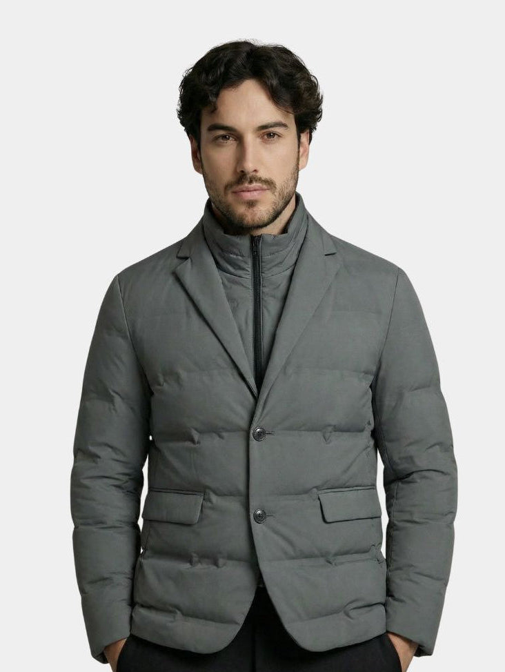Montaracrest Aristocrat winter jacket, stylish and warm brown coat with a high collar and zip closure, suitable for cold weather.