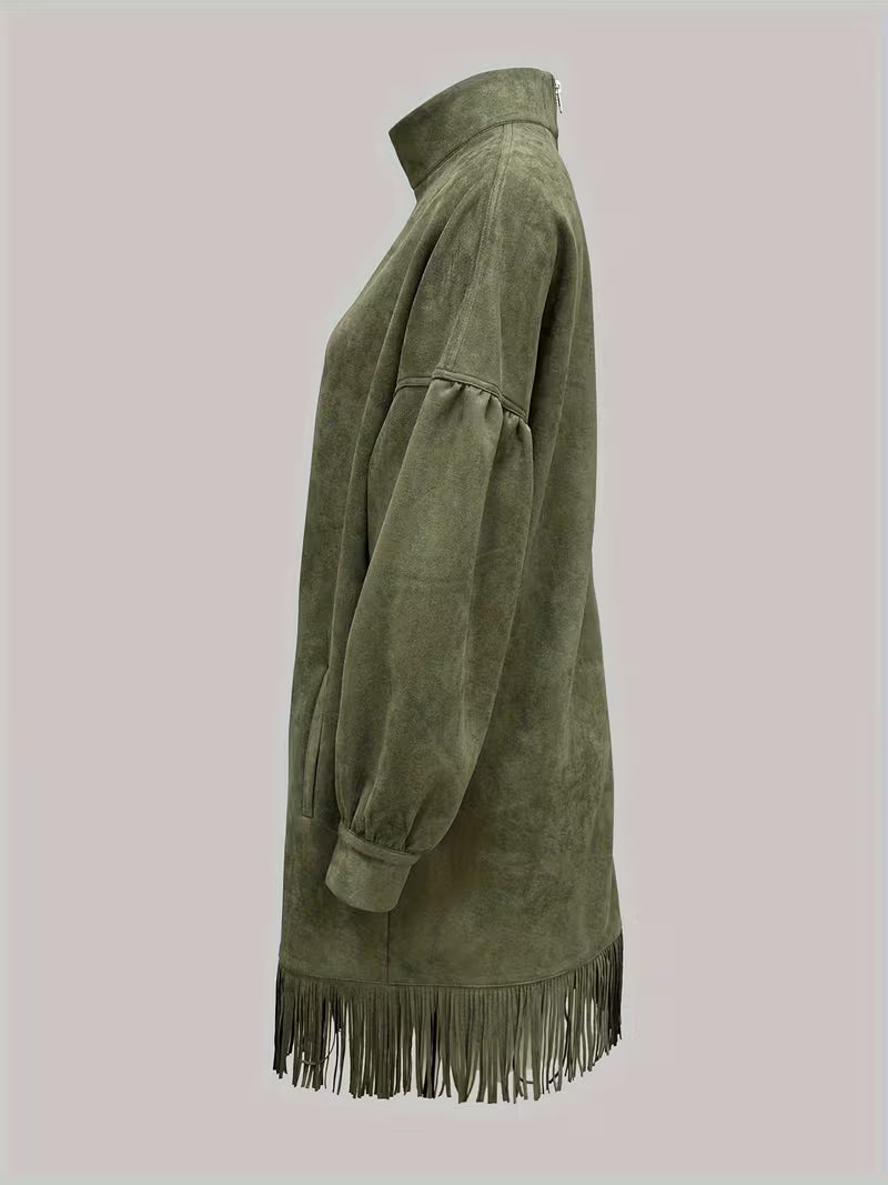 Montaracrest Amalia suede dress with high collar and fringe, shown in a stylish close-up view highlighting fabric details and design.